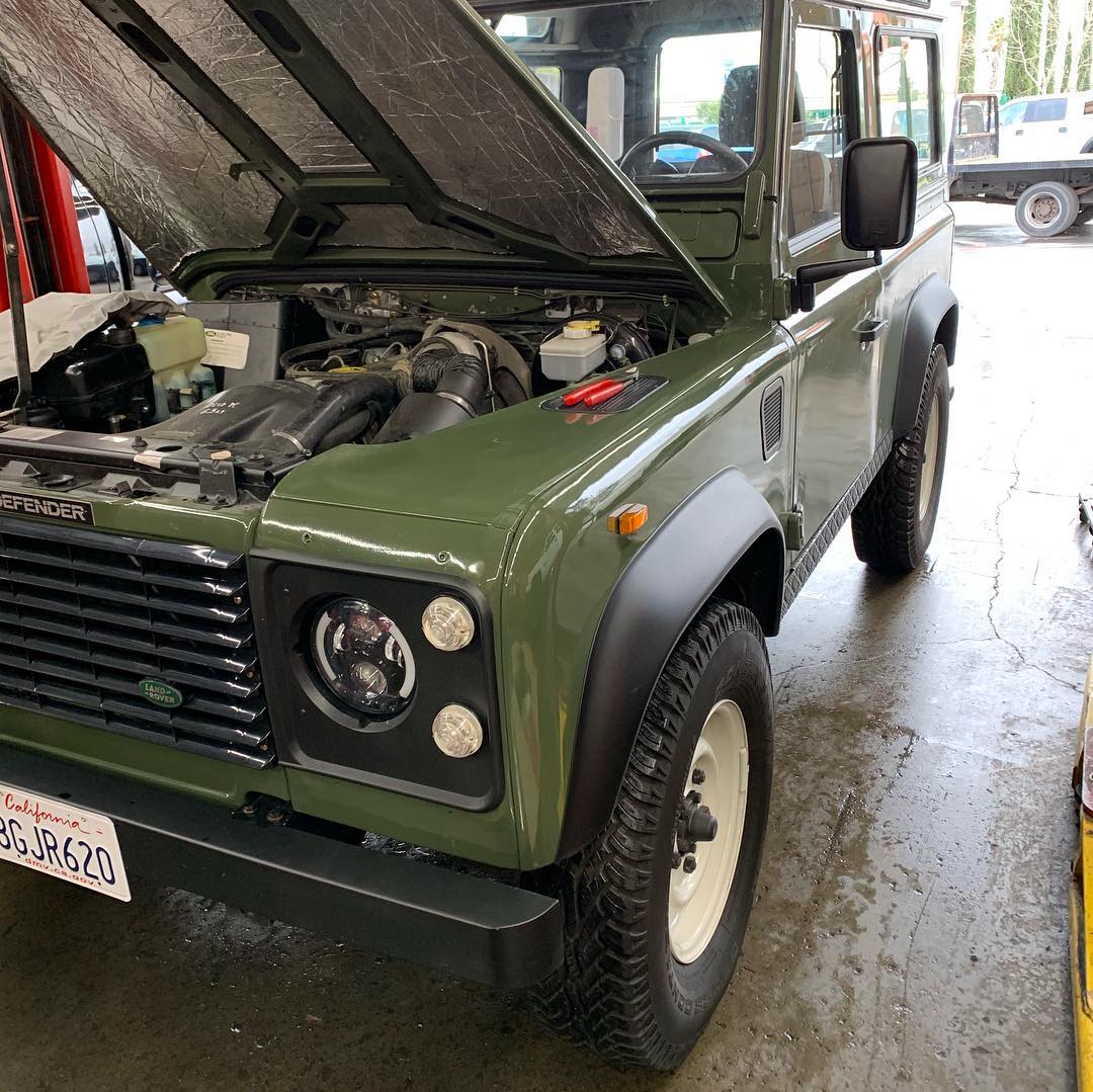 Technician performing diesel diagnostics